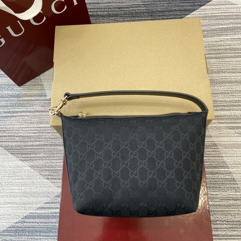 G*u*i top handle bags